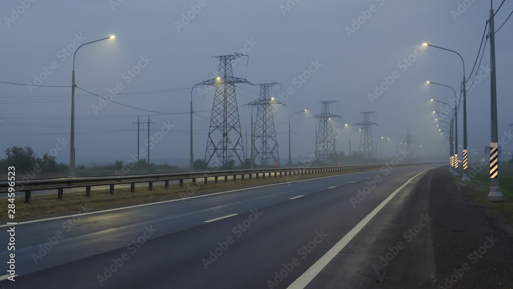 Highway in foggy weather in the morning with fog