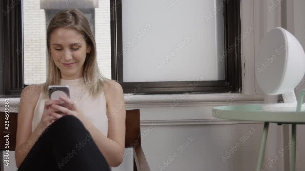 Attractive female blogger working remotely from home Attractive female blogger working remotely from home