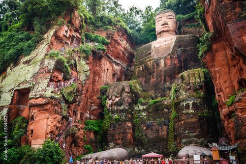 Full view of the Leshan Giant Buddha or Dafo from river boat in Leshan China