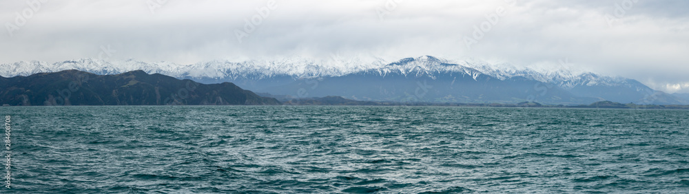 New Zealand seascape with Kaikoura Mountains Background 