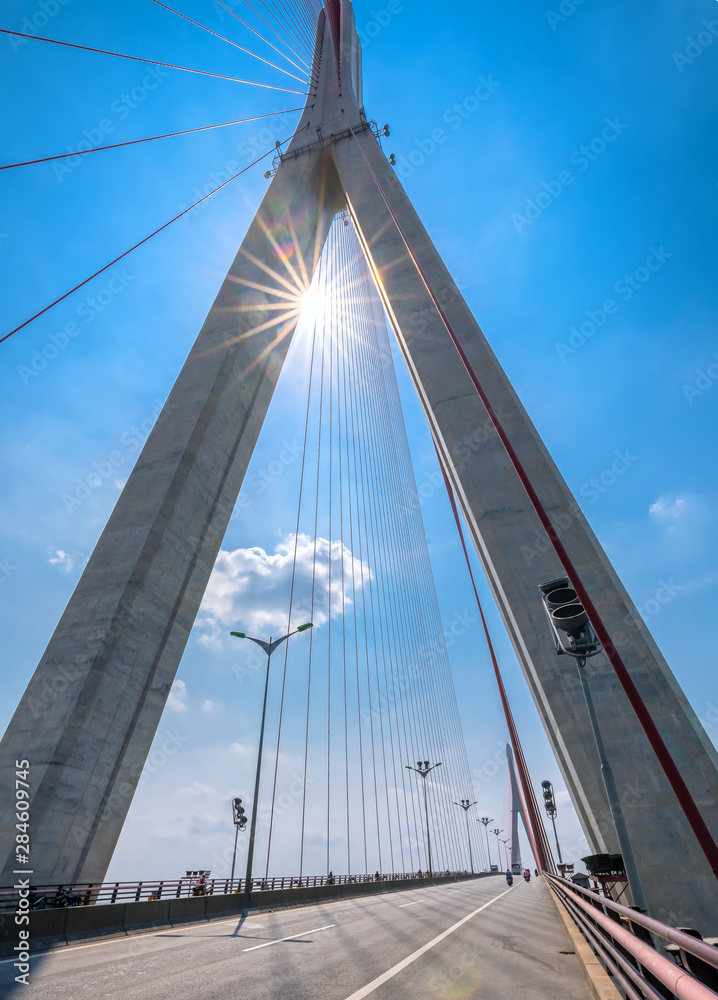 Naklejka premium Can Tho bridge cable traffic stays on the Mekong River in the morning connecting traffic between Vinh Long and Can Tho, Vietnam