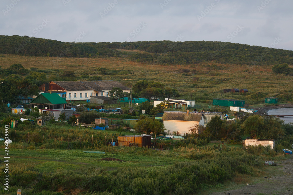 A small village on an island near the sea A small village on an island near the sea