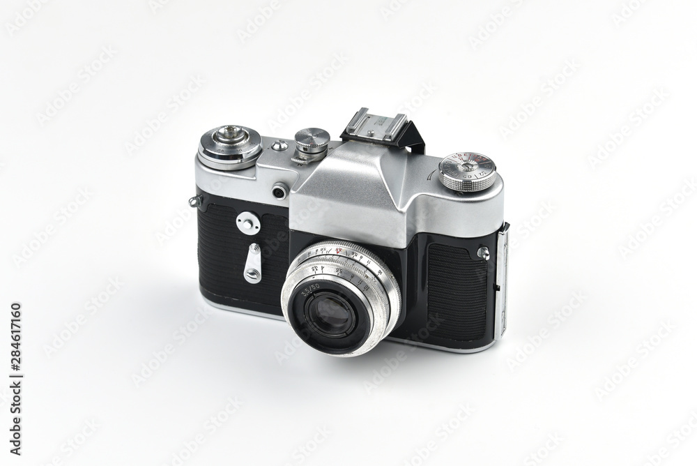 Fototapeta premium Vintage SLR camera isolated on white background