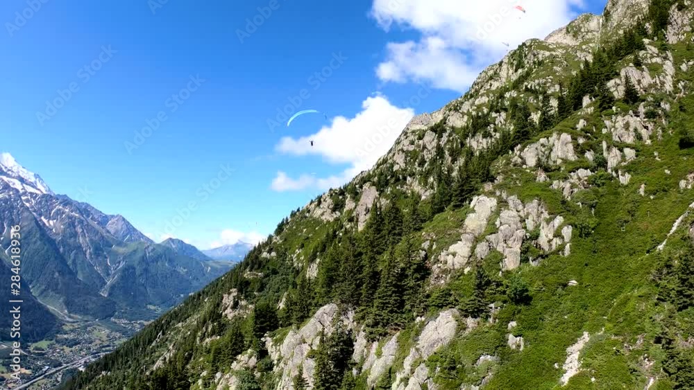 Paragliding. View of the Chamonix Resort from a height, France .4k Paragliding. View of the Chamonix Resort from a height, France .4k