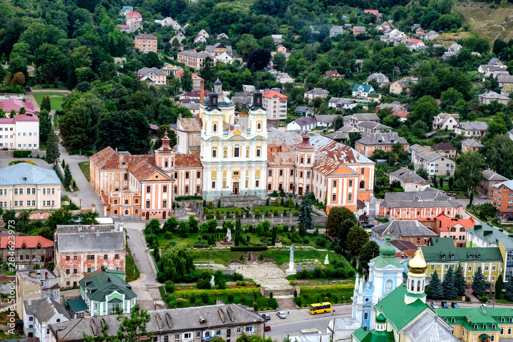 Aerial view to historical center of town Kremenets, Ternopil region, Ukraine. August 2019  Jesuit Collegium in center.