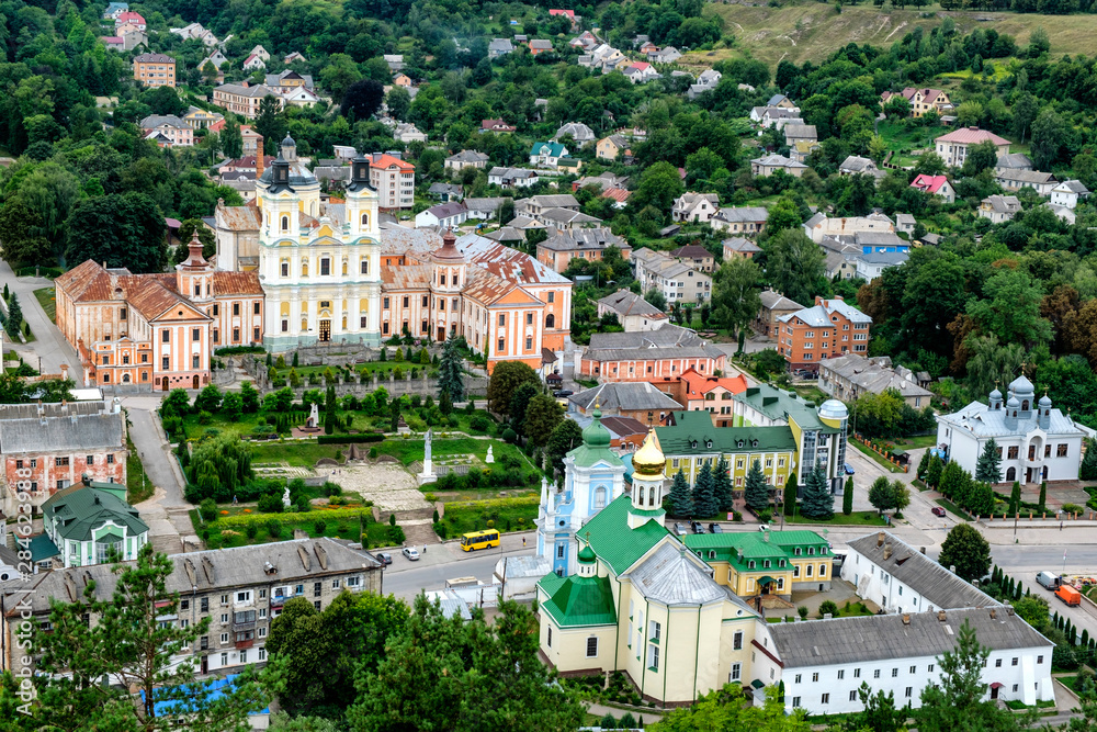 Aerial view to historical center of town Kremenets, Ternopil region, Ukraine. August 2019  Jesuit Collegium in center.