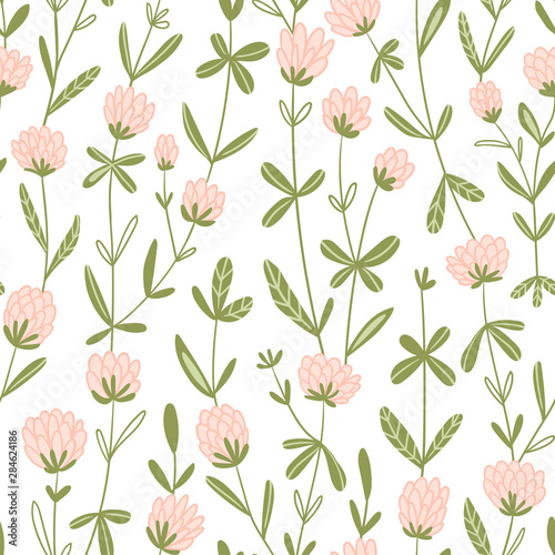 White clover flowers. Vector floral seamless pattern. Cute hand-drawn pattern design for fabric, wallpaper or wrap paper.