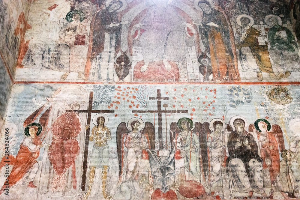 Timotesubani, Georgia-May,04 2019: Interior Church Assumption Blessed Virgin Mary in Timotesubani male Monastery. Painted in years 1205-1215, one of most difficult painting Timotesubani, Georgia-May,04 2019: Interior Church Assumption Blessed Virgin Mary in Timotesubani male Monastery. Painted in years 1205-1215, one of most difficult painting