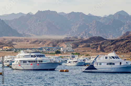 Sharm El Sheikh, Egypt May 08, 2019: Tourist pleasure boats in the harbor of Sharm El Sheikh. © andrei310