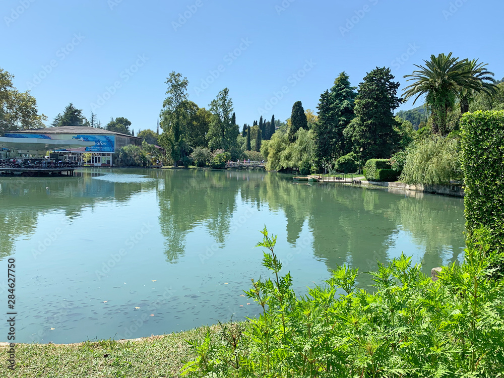 New Athos, Abkhazia. Beautiful pond in summer in sunny day New Athos, Abkhazia. Beautiful pond in summer in sunny day