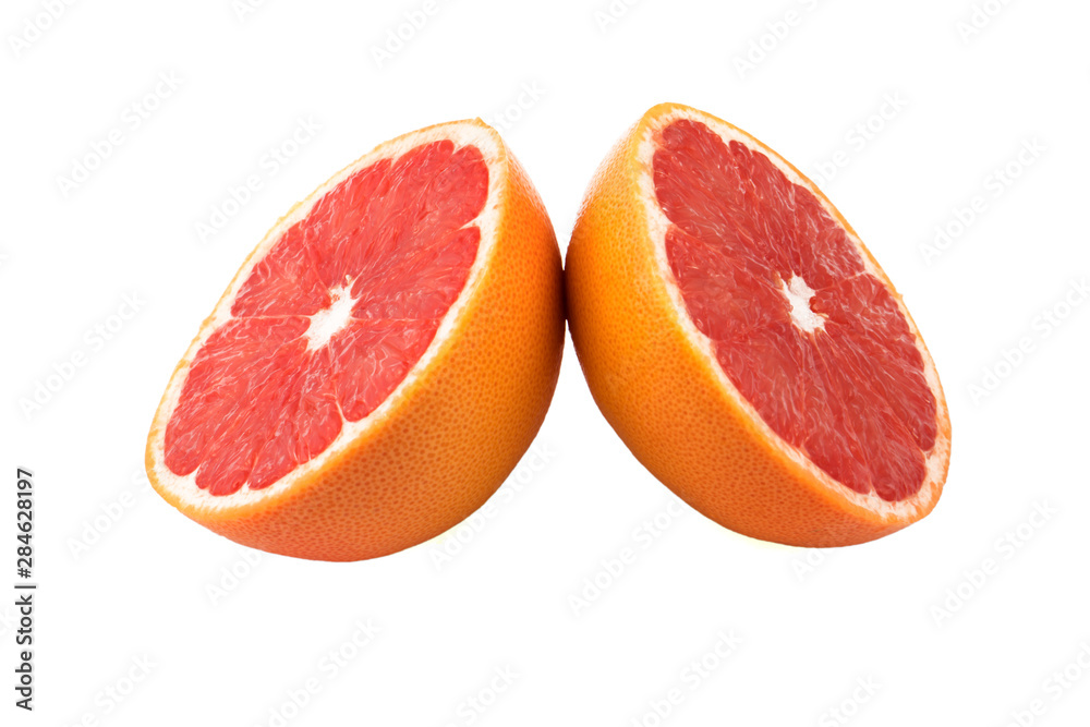 two halves of grapefruit on a white background in isolation two halves of grapefruit on a white background in isolation