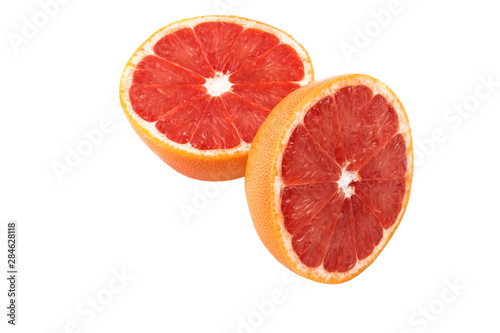 two halves of grapefruit on a white background in isolation