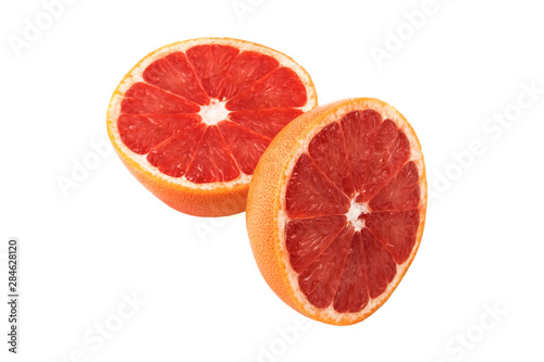 two halves of grapefruit on a white background in isolation