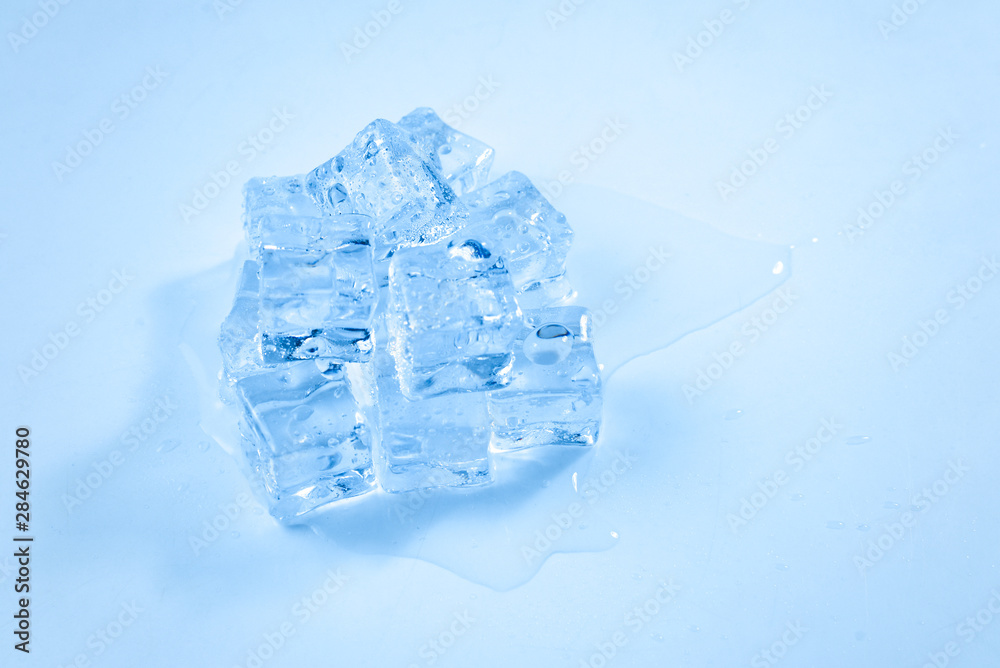 Obraz premium Ice crystal cubes, space for text or design.