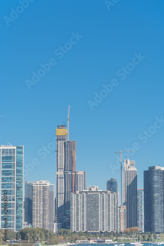 Downtown Chicago from Michigan Lake with yacht marina and skyline buildings background