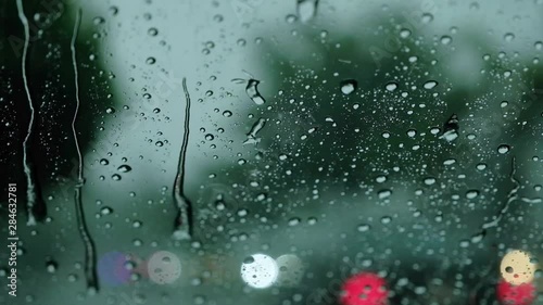 Environment and Ecology Concept. Rain Drop on Glass Window. Rainy Day on the Road photo