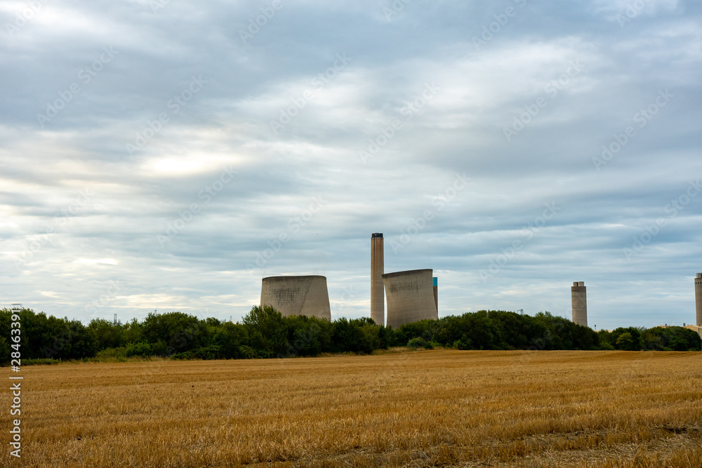 Didcot inactive power plant cooling towers early state of collapse during demolition at 18th of August 2019