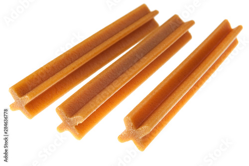 tendon sticks for dog isolated