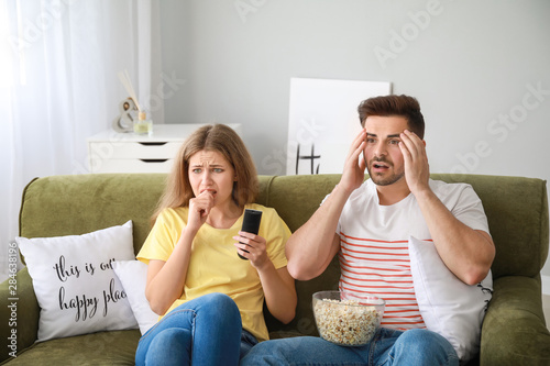 Couple watching scary movie...
