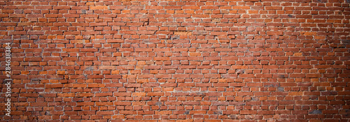 Panoramic Old urban Red Brick Wall Background.