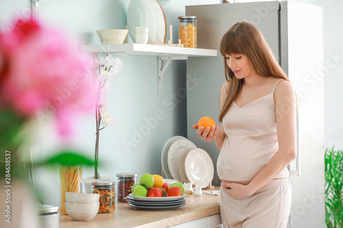 Beautiful pregnant woman wi...