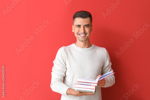 Handsome male teacher with ...