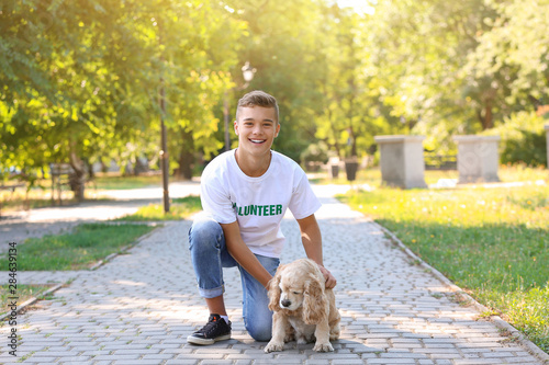 Teenage volunteer with cute...