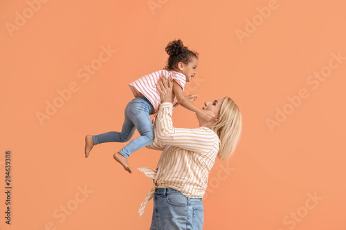Happy woman and her little ...