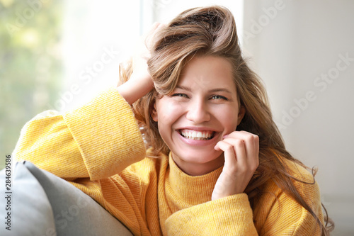 Portrait of happy young wom...