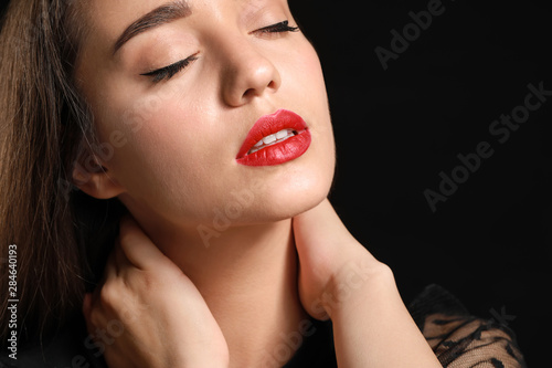 Beautiful young woman with ...