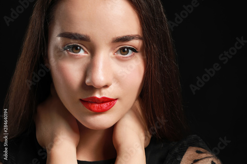 Beautiful young woman with ...
