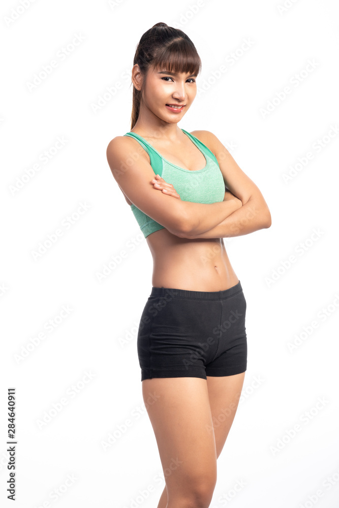Fitness woman white background. Asian woman. Arm cross, very happy smile.