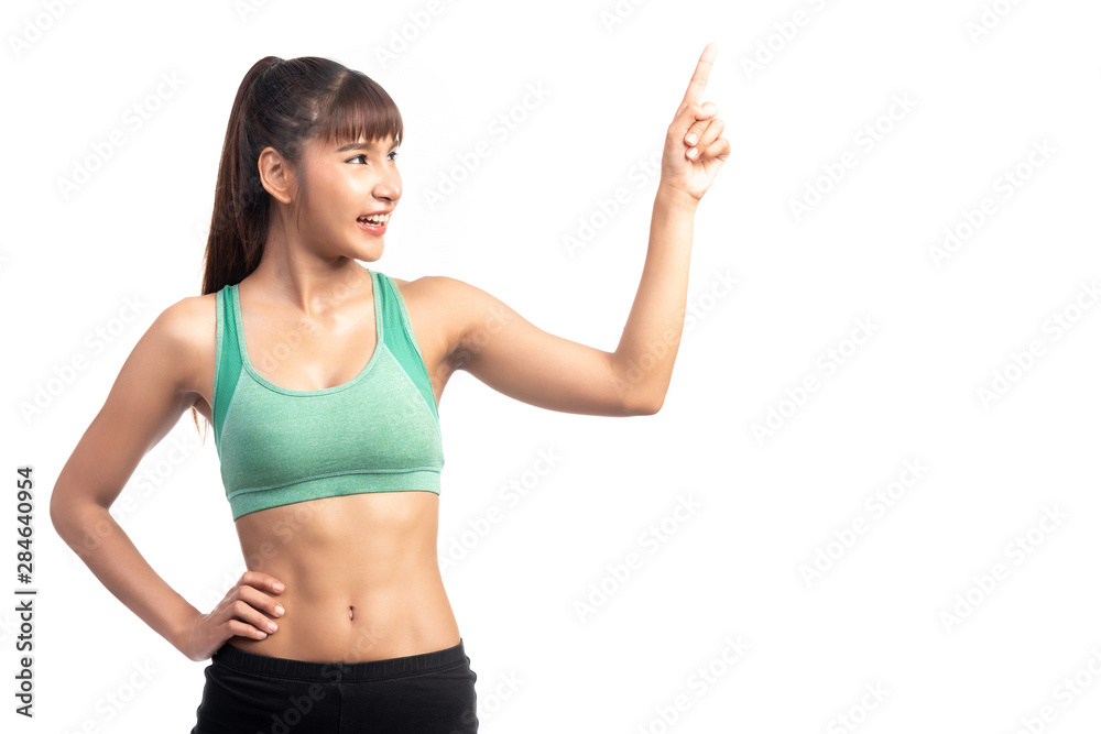 Fitness woman white background. Asian woman. Pointing to the right. Fitness woman white background. Asian woman. Pointing to the right.
