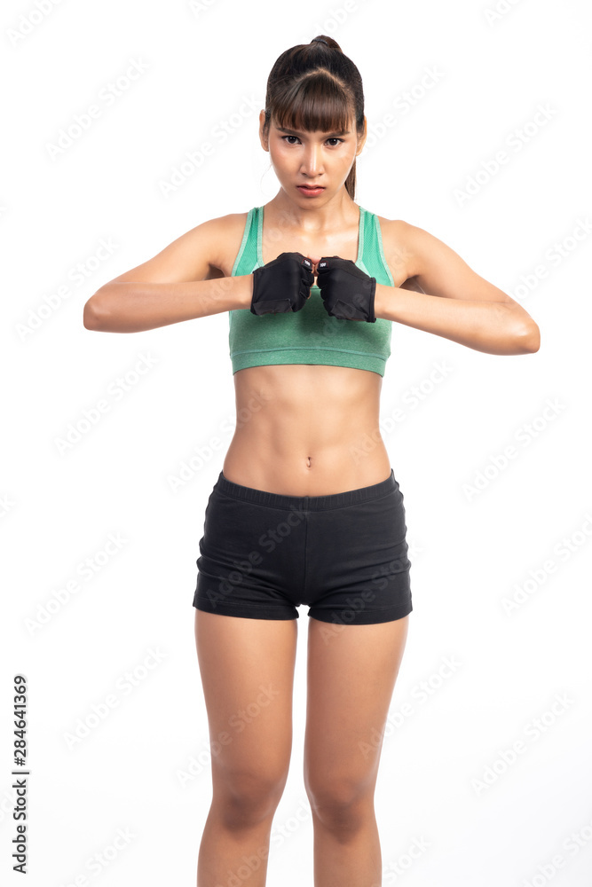 Mix martial art woman portrait in white background. Asian girl, touching gloves. Mix martial art woman portrait in white background. Asian girl, touching gloves.
