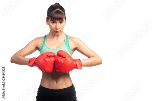 Fitness woman boxer isolated in white background. Asian girl, ready to fight.