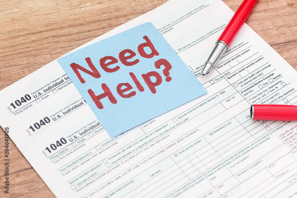 Obraz premium 1040 tax form with sticker - need help