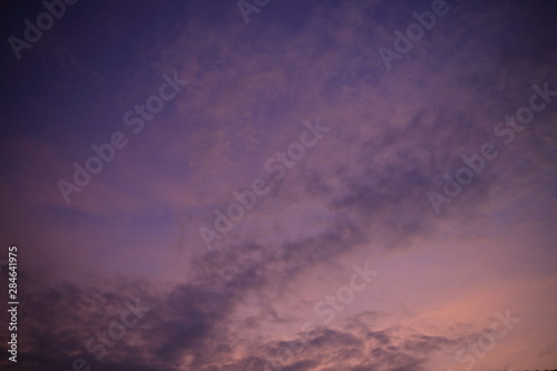 romantic god light sky and clouds of sunset hour time. pale purple sky. peaceful atmosphere during last light of the day.