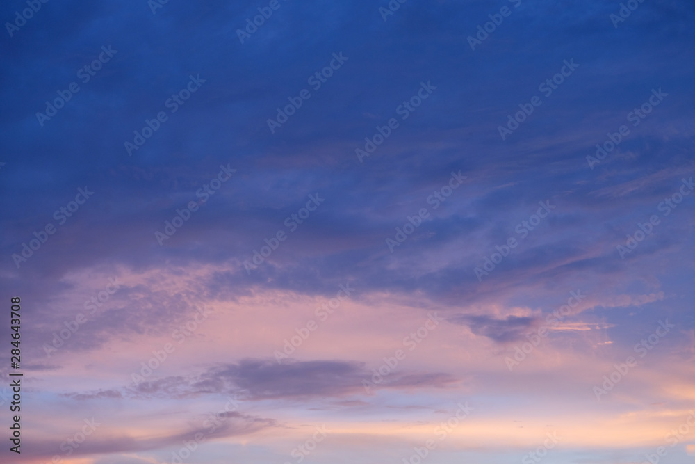 cloud sky with gradient color from blue to purple. sunset sky background