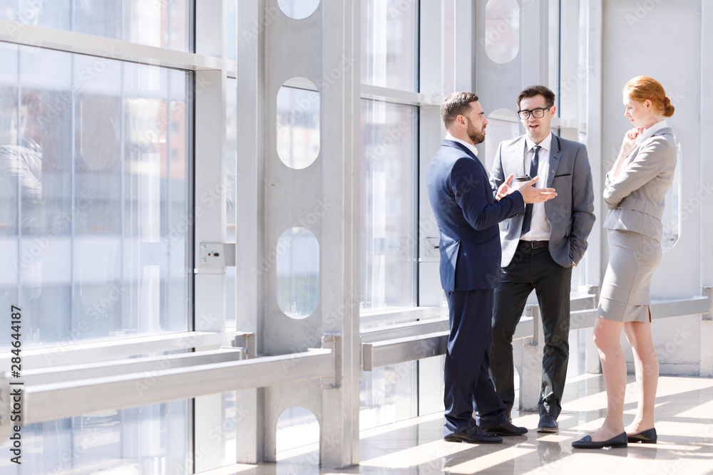 Business people talking at break