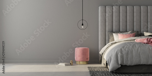 Bedroom with large gray bed and pink pouf. 3d render photo