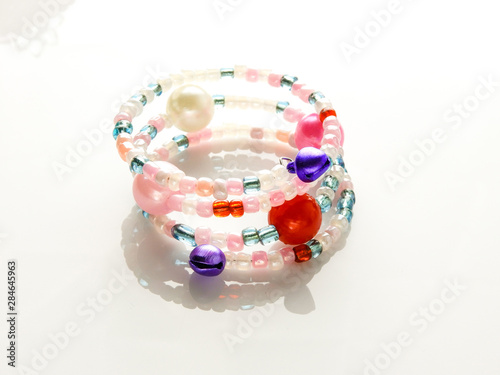 Multi-colored bracelets with beads. Colourful child's bead bracelet.Multi-colored bracelets with beads. Colourful child's bead bracelet.