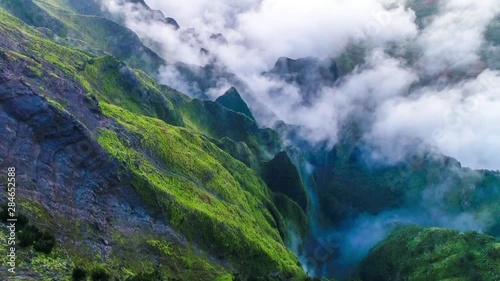 Aerial shot of the cliff mountain and the sea in Na Pali coast in Kauai Hawaii