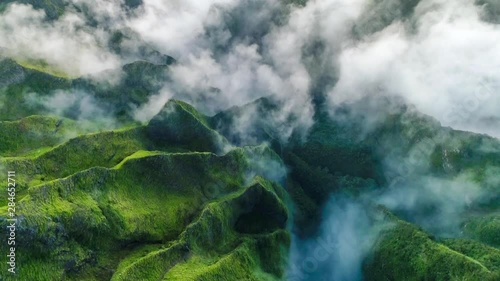 Aerial shot of the cliff mountain and the sea in Na Pali coast in Kauai Hawaii