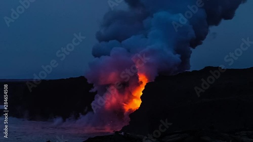Volcanic Eruption and Lava flows out of the sea in Big Island Hawaii
