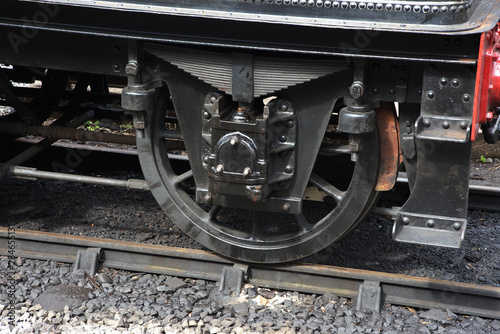 close up of steam train wheel