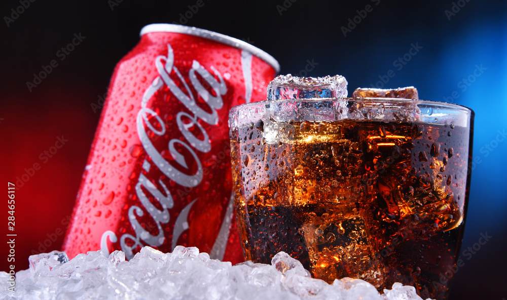 A glass and a can of Coca-Cola Stock Photo | Adobe Stock