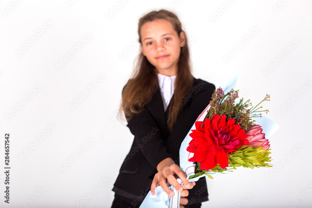 Children with flowers on white isolated backgroung smiling and happy. Childhood, floral concept Children with flowers on white isolated backgroung smiling and happy. Childhood, floral concept
