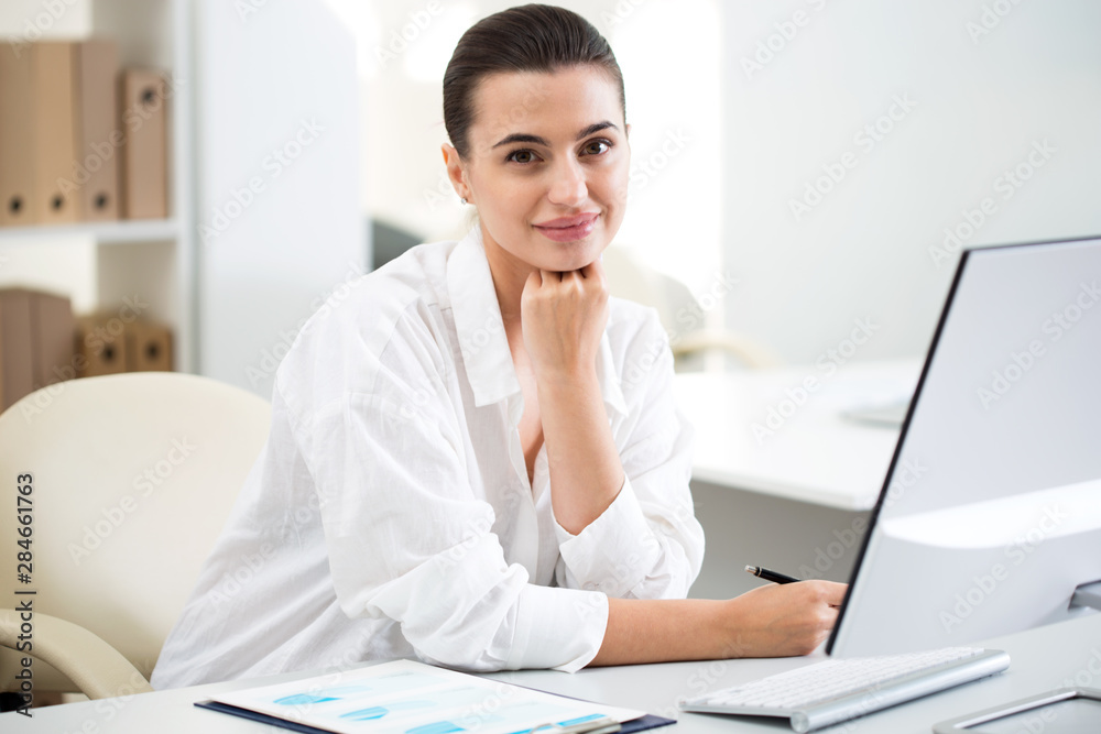 Young beautiful businesswoman with computer Young beautiful businesswoman with computer
