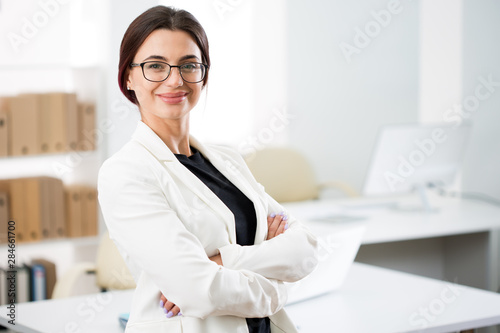 Portrait of a smiling young attractive business woman