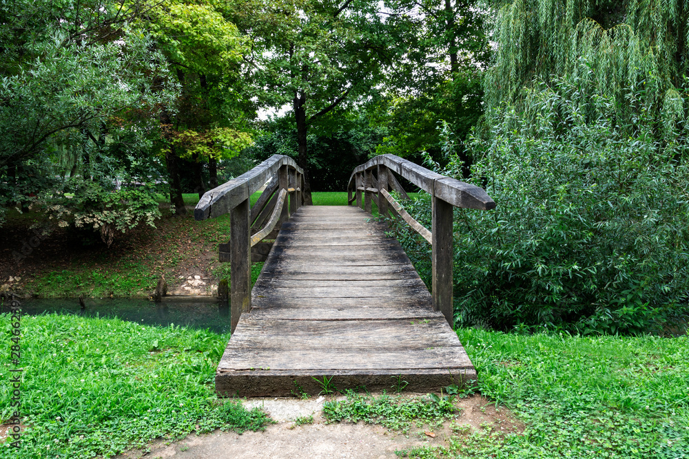 Kostanjevica na Krki, wooden bridge over the river Kostanjevica na Krki, wooden bridge over the river